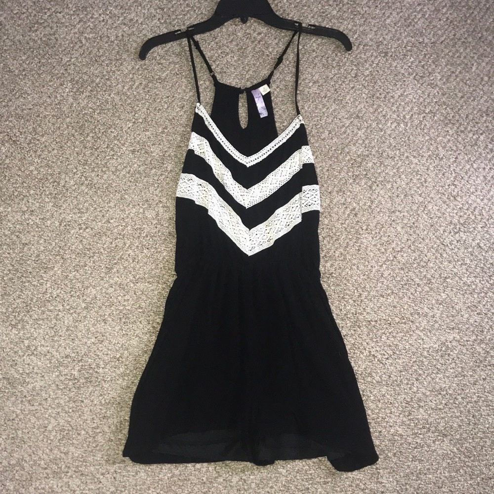 Francesca’s Black Romper With White Crochet Detail
